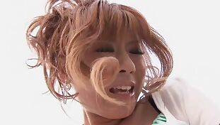Kinky Japanese girl wears a remote controlled vibrator in her shorts
